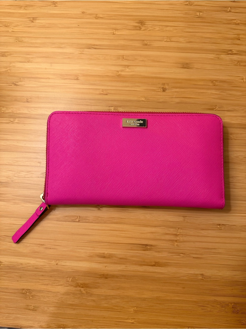 Kate Spade Pink Wallet with Striped Lining and Gold Plaque Detailing